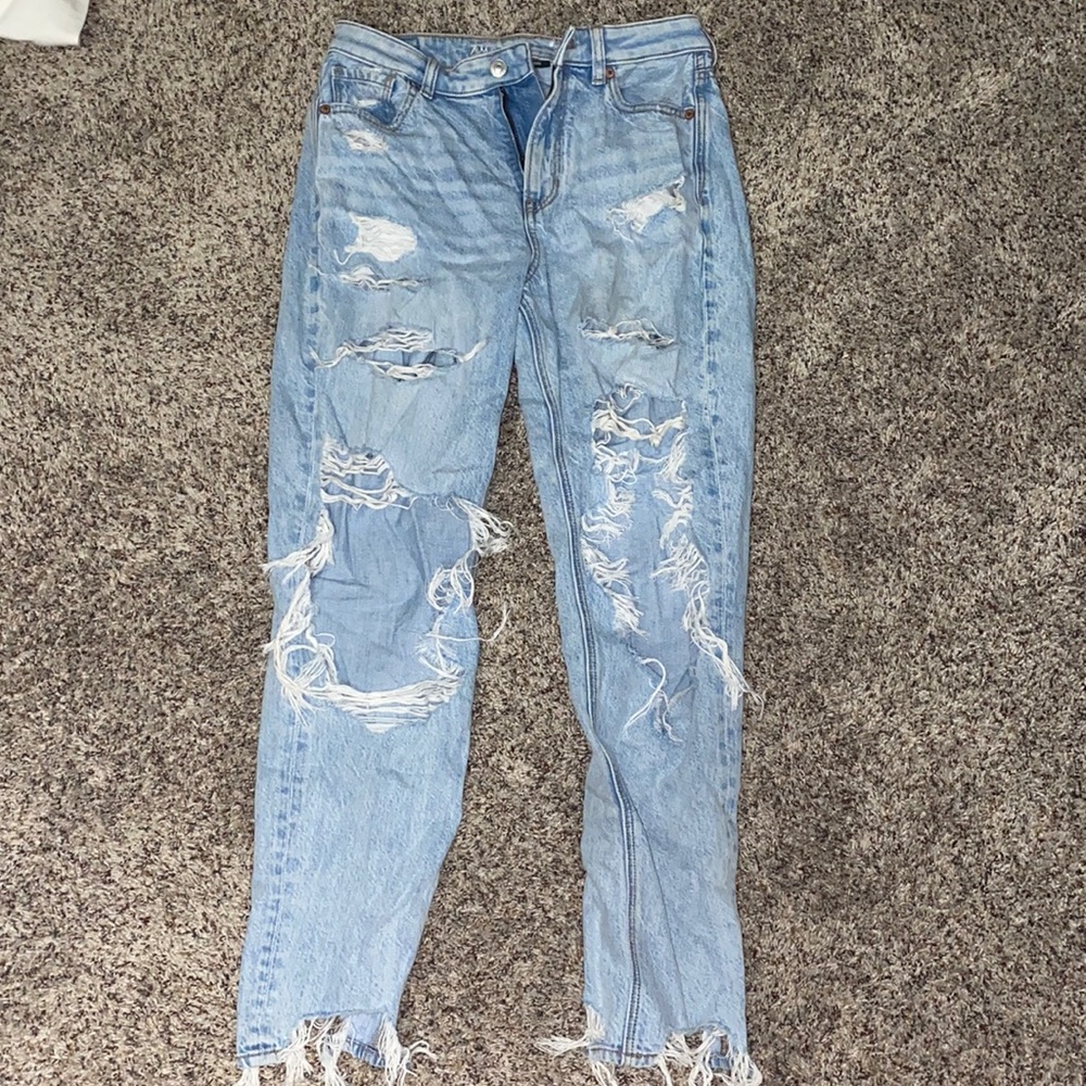 light washed ripped american eagle jeans
